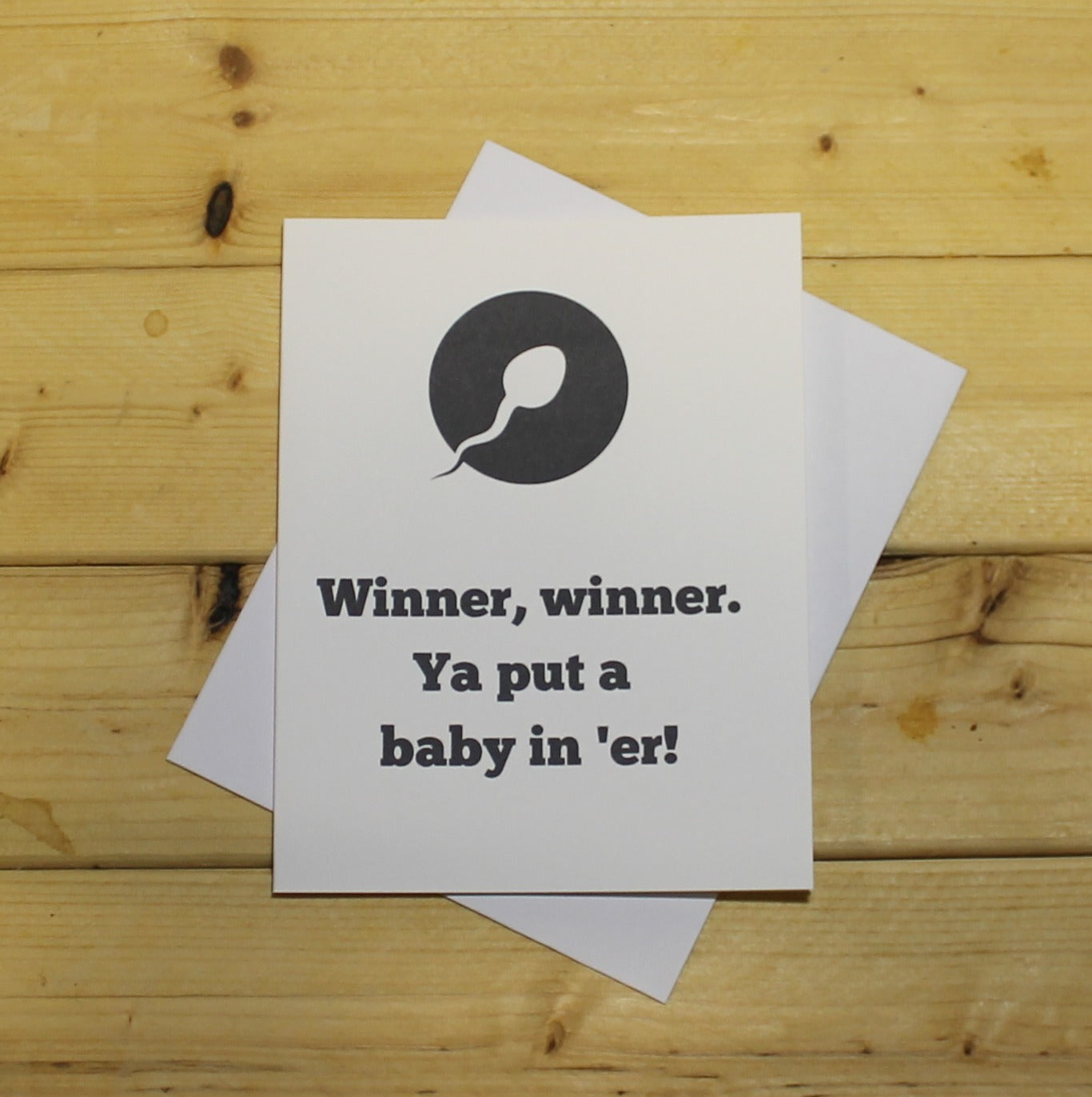 Funny Baby Card: "Winner, winner! Ya put a baby in 'er."